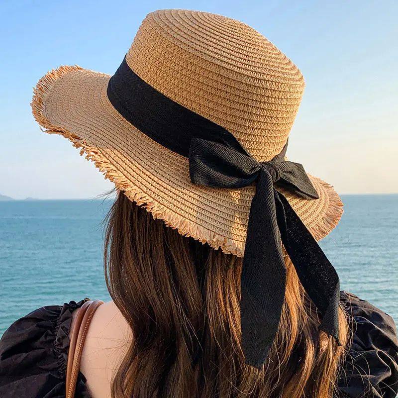 Korean-Inspired Wide-Brim Straw Hat with Bow Detail