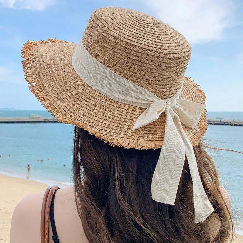 Korean-Inspired Wide-Brim Straw Hat with Bow Detail