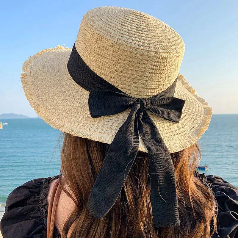 Korean-Inspired Wide-Brim Straw Hat with Bow Detail