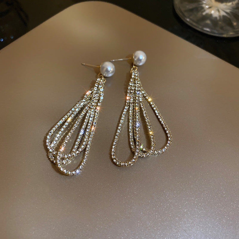 Pearl and Rhinestone Copper Alloy Earrings with Gold Finish