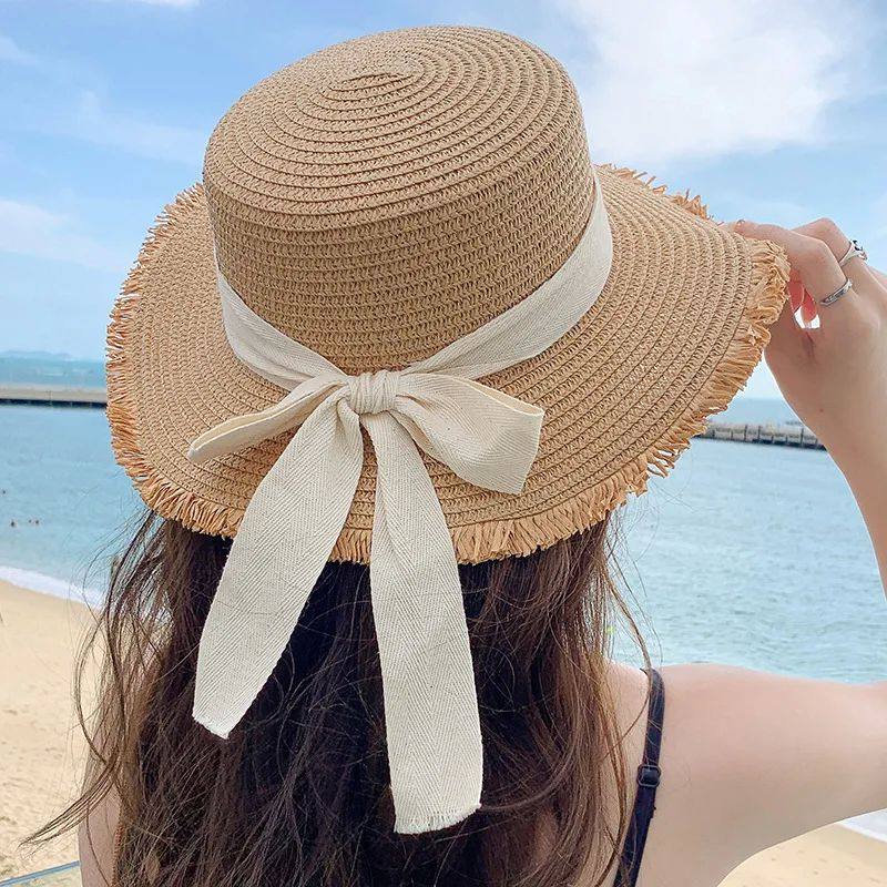 Korean-Inspired Wide-Brim Straw Hat with Bow Detail